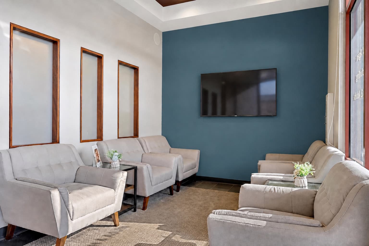 Brightly Dental Parker West waiting room with teal accent wall
